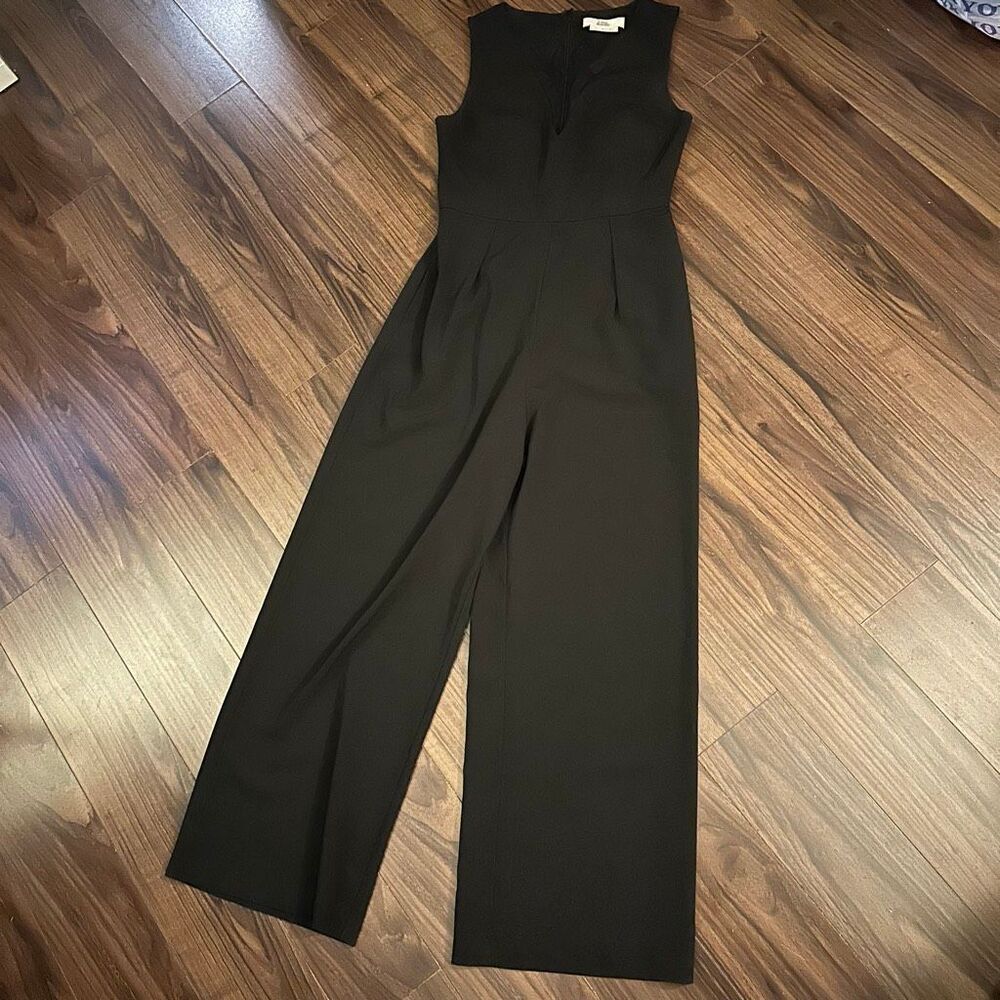 Love Benito sleeveless black jumpsuit size 4